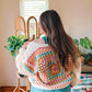 Rainbow Patch Granny Cardigan worn, showing granny-square back and sleeves