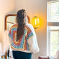 Rainbow Patch Granny Cardigan worn, showing granny-square back and sleeves